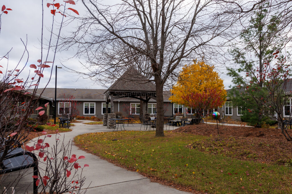 Outdoor courtyard and gazebo at Westhaven Community in Boone, Iowa with walking paths, seating areas, and landscaped grounds.