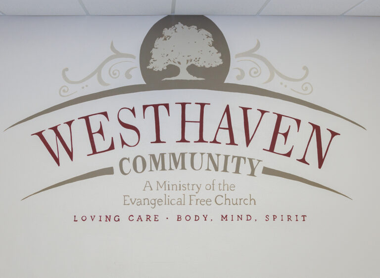Westhaven Community logo on interior wall.